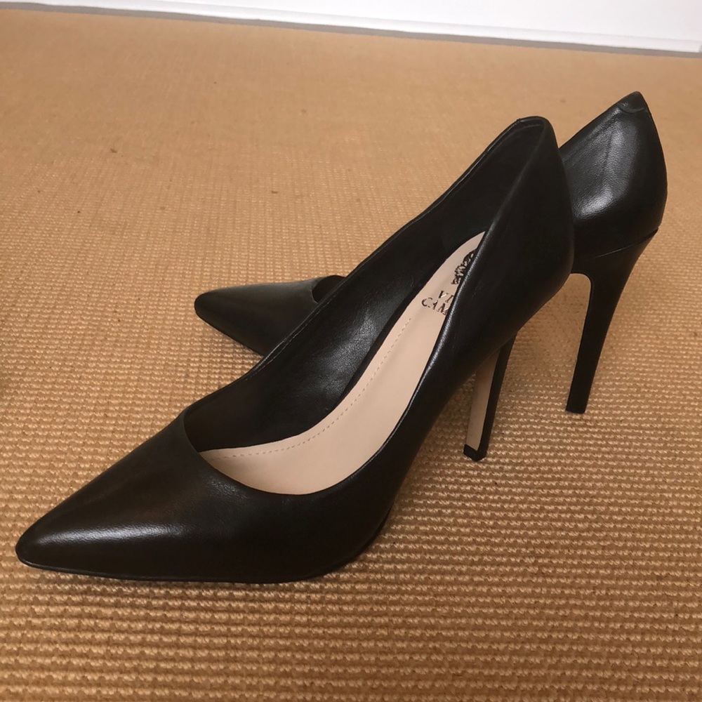 Black leather pumps